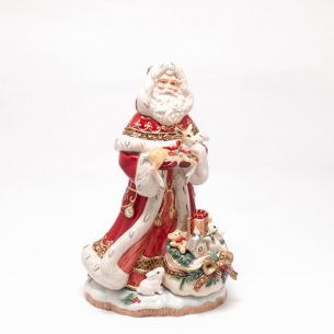 Статуэтка "Дед Мороз с оленёнком на руках"