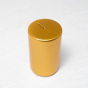Свеча Lucid золотая в форме цилиндра