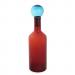 Высокая красная ваза в форме бутылки с пробкой-колбой