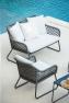 Металлическое балконное кресло с мягкой подушкой и узорным плетением Moma Skyline Design  - фото