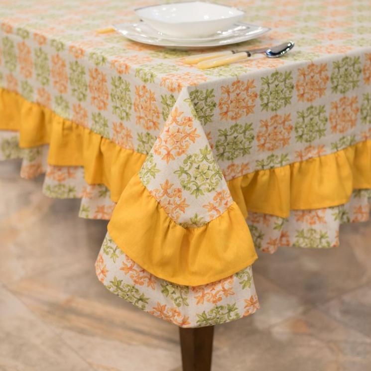 Скатертина текстильна з оранжево-зеленим орнаментом, рюшами та акриловим просоченням. Emilia Arredamento - фото