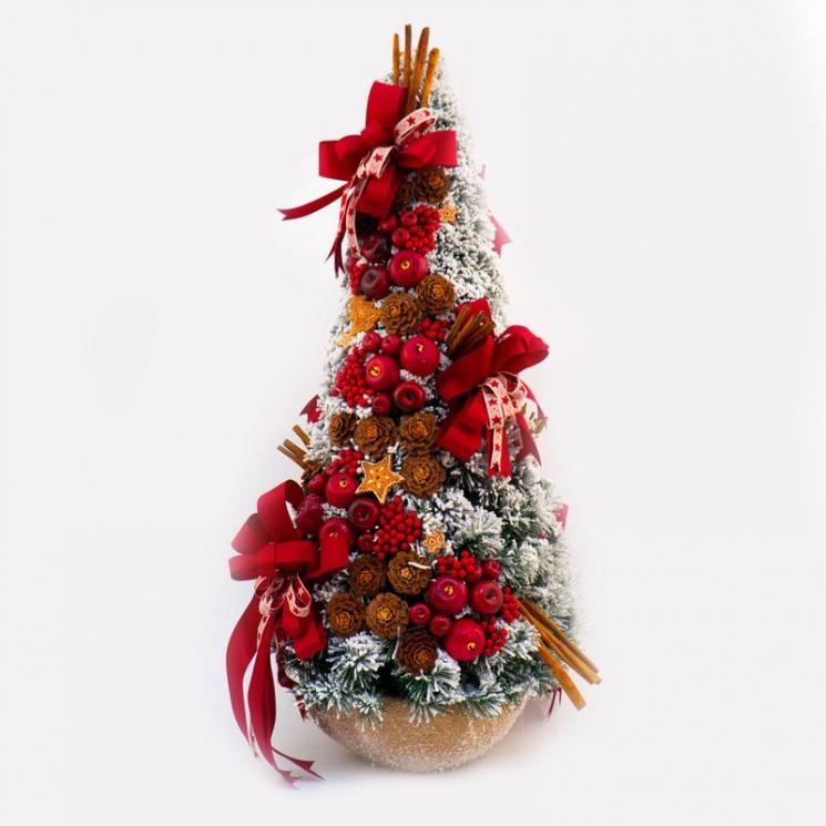 Новорічна ялина в округлій підставці, декорована снігом та червоними бантами. Villa Grazia - фото