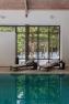 Коричневий шезлонг зі штучного ротанга для відпочинку біля басейну та на терасі Imperial Red Pullut Skyline Design  - фото