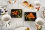 Набір з 4-х чорних тарілок для закусок з флористичним мотивом "Квіткова рапсодія" Certified International  - фото