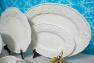 Посуд білого кольору з опуклими малюнками птахів та гілочками артишоку. Bordallo  - фото